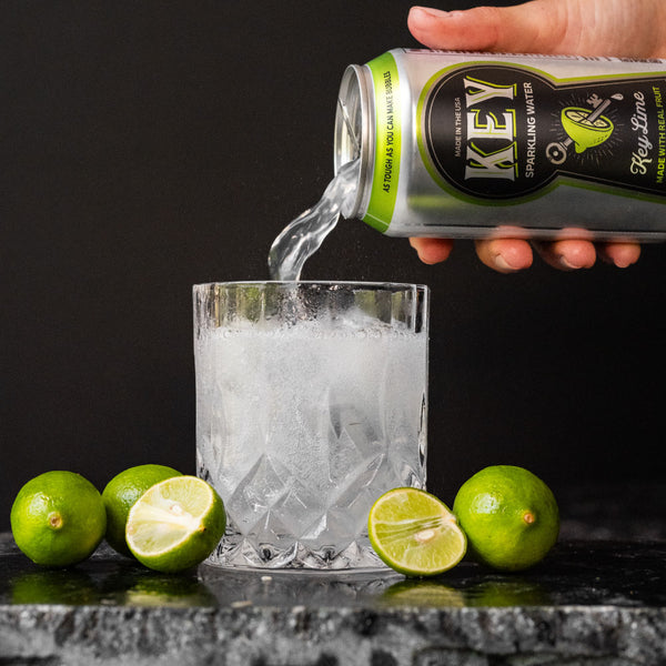 Key Sparkling Water Key Lime Can Pouring into Glass